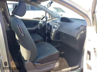 2008 Toyota Yaris with VIN JTDJT923885191561, listed as a IAAI auction lot 42018083 with 228,090 mi miles. Bid and sale history available at carsss.com. Image 5.