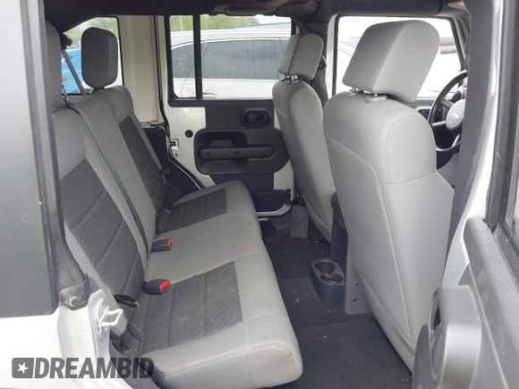 2008 Jeep Wrangler Unlimited X with VIN 1J4GA39108L510829, listed as a IAAI auction lot 42069589 with 108,696 mi miles and . Bid and sale history available at DreamBid. Image 8.
