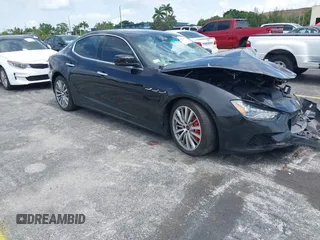 2015 Maserati Ghibli S Q4 with VIN ZAM57RTA3F1145302, listed as a IAAI auction lot 42637594 with 101,128 mi miles and . Bid and sale history available at DreamBid. Image 1.