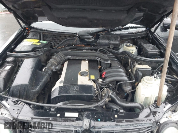1996 Mercedes-Benz E-Class with VIN WDBJF55F0TJ007170, listed as a IAAI auction lot 41147514 with 122,044 mi miles. Bid and sale history available at carsss.com. Image 10.