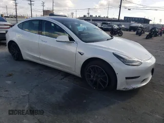 2019 Tesla Model 3 Mid Range with VIN 5YJ3E1EA5KF485116, listed as a Copart auction lot 49289295 with 39,911 mi miles and Salvage Title. Bid and sale history available at DreamBid. Image 4.