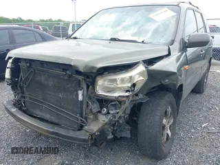 2006 Honda Pilot EX-L with VIN 5FNYF18776B011211, listed as a IAAI auction lot 39555749 with 295,998 mi miles and . Bid and sale history available at DreamBid. Image 6.