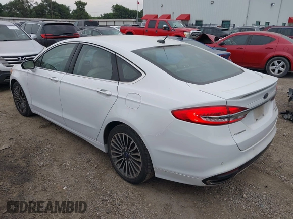 2017 Ford Fusion Titanium z VIN 3FA6P0K96HR124146, wystawiony jako IAAI lot #42428041 z przebiegiem 204 306 mil mil oraz . Historia ofert i sprzedaży dostępna na DreamBid. Obrazek 3.