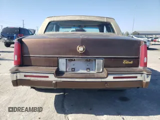1988 Cadillac Eldorado z VIN 1G6EL115XJU611177, wystawiony jako Copart lot #46526855 z przebiegiem 122 780 mil mil oraz Szkody całkowita. Historia ofert i sprzedaży dostępna na DreamBid. Obrazek 6.