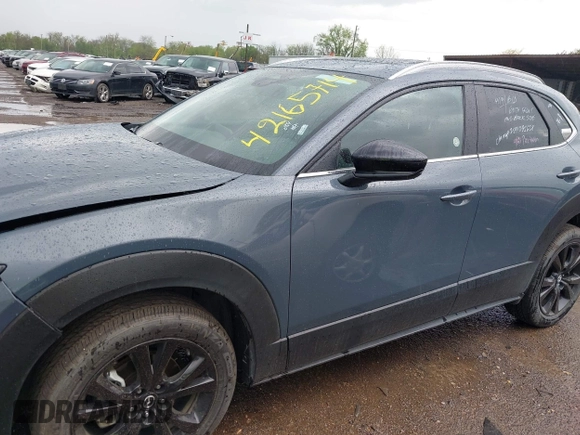 2025 Mazda CX-30 S Carbon Edition с VIN 3MVDMBCM6SM813356, выставлен на аукционе IAAI как лот 42165714 с пробегом 2 338 миль миль и . История ставок и продаж доступна на DreamBid. Изображение 14.