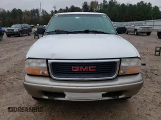 2001 GMC Jimmy SLT with VIN 1GKDT13W712155718, listed as a Copart auction lot 80688554 with 114,116 mi miles and Salvage Title. Bid and sale history available at carsss.com. Image 5.