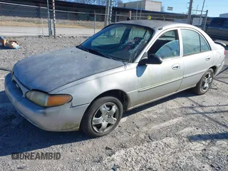 1999 Ford Escort SE с VIN 1FAFP13P6XW161079, выставлен на аукционе IAAI как лот 41230172 с пробегом 121 419 миль миль и . История ставок и продаж доступна на DreamBid. Изображение 2.