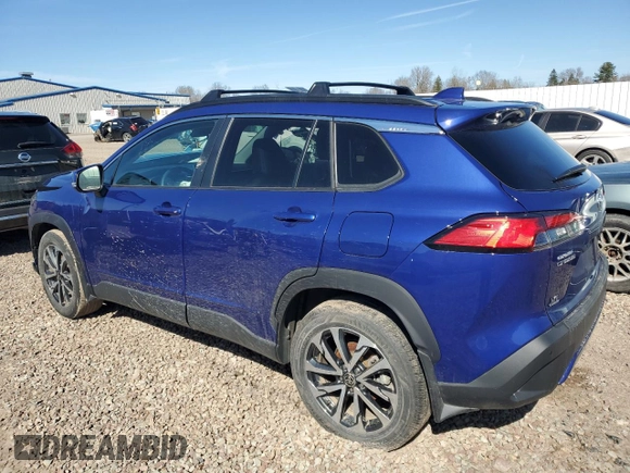 2022 Toyota Corolla Cross XLE with VIN 7MUDAABG3NV006450, listed as a Copart auction lot 53240735 with 19,976 mi miles and Salvage title. Bid and sale history available at DreamBid. Image 2.