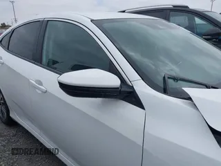 2020 Honda Civic LX with VIN 2HGFC2F64LH593100, listed as a IAAI auction lot 41877572 with 76,713 mi miles and . Bid and sale history available at DreamBid. Image 13.