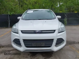 2016 Ford Escape SE with VIN 1FMCU9GX1GUC04085, listed as a IAAI auction lot 42126826 with 130,728 mi miles. Bid and sale history available at carsss.com. Image 12.