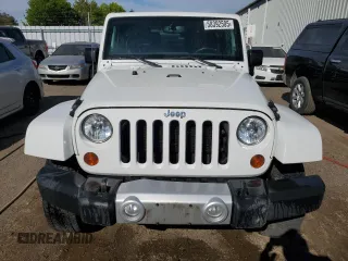 2013 Jeep Wrangler Sahara with VIN 1C4AJWBG0DL517849, listed as a Copart auction lot 58392505 with 119,499 mi miles and Clean title. Bid and sale history available at DreamBid. Image 5.