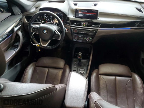 2020 BMW X1 xDrive28i z VIN WBXJG9C00L5P42487, wystawiony jako Copart lot #59669325 z przebiegiem 88 402 mil mil oraz Szkoda całkowita • Salvage title. Historia ofert i sprzedaży dostępna na DreamBid. Obrazek 8.