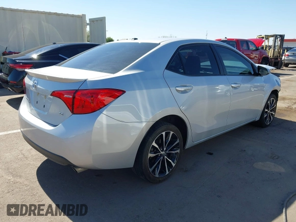 2017 Toyota Corolla L with VIN 2T1BURHE8HC939058, listed as a IAAI auction lot 42530114 with 68,636 mi miles and . Bid and sale history available at DreamBid. Image 4.