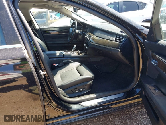 2012 BMW 7 Series 750i with VIN WBAKA8C50CCY37892, listed as a IAAI auction lot 42080313 with 148,058 mi miles. Bid and sale history available at carsss.com. Image 5.