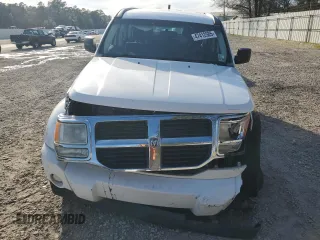 2011 Dodge Nitro SE z VIN 1D4PT2GK3BW584020, wystawiony jako Copart lot #47412585 z przebiegiem 83 790 mil mil oraz Szkoda całkowita • Salvage title. Historia ofert i sprzedaży dostępna na DreamBid. Obrazek 5.