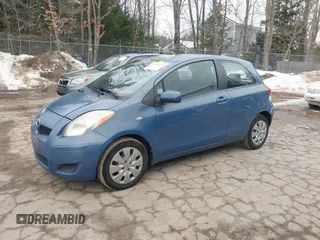 2009 Toyota Yaris with VIN JTDJT903495259987, listed as a IAAI auction lot 41731179 with 159,097 mi miles. Bid and sale history available at carsss.com. Image 12.