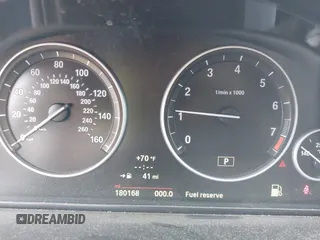 2014 BMW 5 Series 528i with VIN WBA5A5C5XED512045, listed as a IAAI auction lot 42152735 with 180,168 mi miles. Bid and sale history available at carsss.com. Image 7.