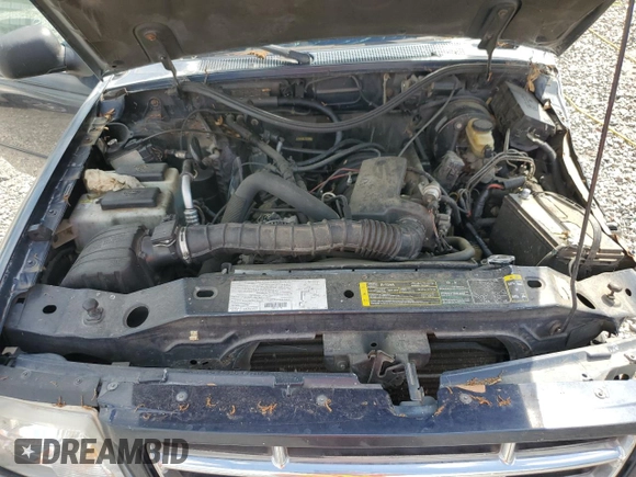 2003 Ford Ranger with VIN 1FTZR44V03PB03182, listed as a Copart auction lot 58736475 with 238,277 mi miles and Salvage title. Bid and sale history available at DreamBid. Image 11.