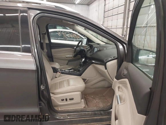 2015 Ford Escape Titanium with VIN 1FMCU9J96FUA43337, listed as a IAAI auction lot 41825328 with 149,639 mi miles and . Bid and sale history available at DreamBid. Image 5.