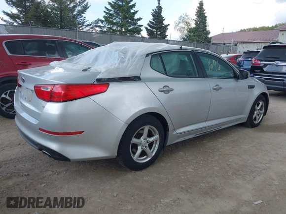 2014 Kia Optima LX with VIN 5XXGM4A71EG337837, listed as a IAAI auction lot 42251696 with 115,063 mi miles and . Bid and sale history available at DreamBid. Image 4.