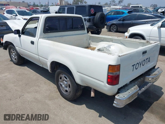 1992 Toyota Pickup z VIN JT4RN81A0N0090921, wystawiony jako IAAI lot #42465321 z przebiegiem 166 211 mil mil oraz . Historia ofert i sprzedaży dostępna na DreamBid. Obrazek 3.