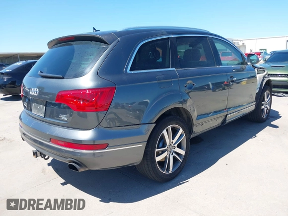 2015 Audi Q7 Premium Plus with VIN WA1LGAFE7FD002275, listed as a IAAI auction lot 42314167 with 144,291 mi miles and . Bid and sale history available at DreamBid. Image 4.