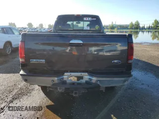 2005 Ford F-350 XL z VIN 1FTWW31P55EA45693, wystawiony jako Copart lot #66947005 z przebiegiem 193 308 mil mil oraz Czysty tytuł • Clean title. Historia ofert i sprzedaży dostępna na DreamBid. Obrazek 6.