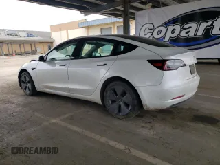 2022 Tesla Model 3 Long Range with VIN 5YJ3E1EB2NF267485, listed as a Copart auction lot 54952505 with 30,569 mi miles and Clean Title. Bid and sale history available at DreamBid. Image 2.