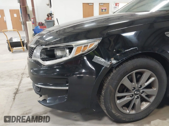2016 Kia Optima LX Turbo with VIN 5XXGT4L16GG013751, listed as a IAAI auction lot 41843481 with 163,969 mi miles. Bid and sale history available at carsss.com. Image 6.