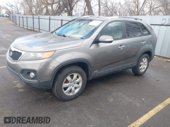 2011 Kia Sorento LX with VIN 5XYKTDA15BG055068, listed as a IAAI auction lot 41811844 with 168,685 mi miles. Bid and sale history available at carsss.com. Image 2.