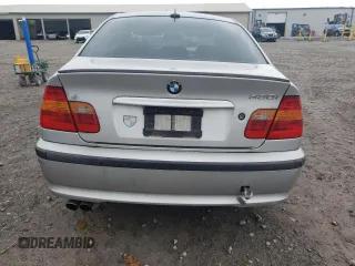 2005 BMW 3 Series 330i with VIN WBAEV53415KM42569, listed as a Copart auction lot 82333804 with 195,594 mi miles and Salvage Title. Bid and sale history available at carsss.com. Image 6.