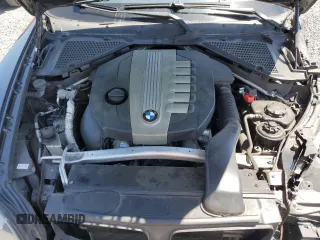 2011 BMW X5 35d with VIN 5UXZW0C58BL662048, listed as a Copart auction lot 55648975 with 166,291 mi miles and Salvage title. Bid and sale history available at DreamBid. Image 12.