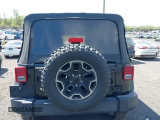 2018 Jeep Wrangler JK Unlimited Sport S with VIN 1C4BJWDG9JL816592, listed as a IAAI auction lot 42187279 with 91,169 mi miles. Bid and sale history available at carsss.com. Image 16.