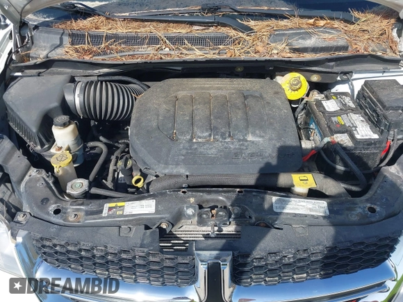 2019 Dodge Grand Caravan SE with VIN 2C4RDGBG8KR646829, listed as a IAAI auction lot 42136947 with 73,015 mi miles and . Bid and sale history available at DreamBid. Image 10.