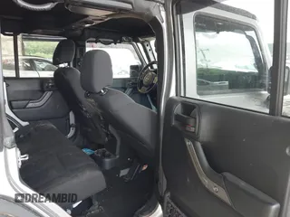 2017 Jeep Wrangler Unlimited Sport with VIN 1C4BJWDG1HL591515, listed as a IAAI auction lot 42426201 with 124,131 mi miles and . Bid and sale history available at DreamBid. Image 8.