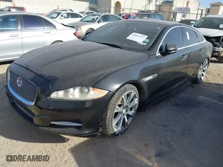 2015 Jaguar XJ with VIN SAJWA1CZ1F8V90549, listed as a IAAI auction lot 41817327 with NaN miles. Bid and sale history available at carsss.com. Image 17.