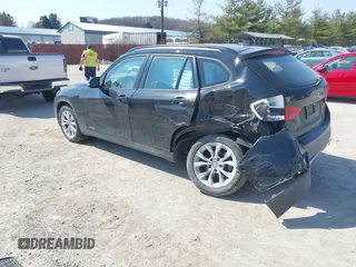 2013 BMW X1 xDrive28i with VIN WBAVL1C59DVR87469, listed as a IAAI auction lot 41775333 with 124,220 mi miles. Bid and sale history available at carsss.com. Image 3.