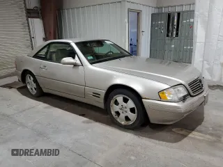 1999 Mercedes-Benz SL-Class with VIN WDBFA68F9XF172312, listed as a Copart auction lot 61248884 with 104,331 mi miles and Salvage Title. Bid and sale history available at carsss.com. Image 4.