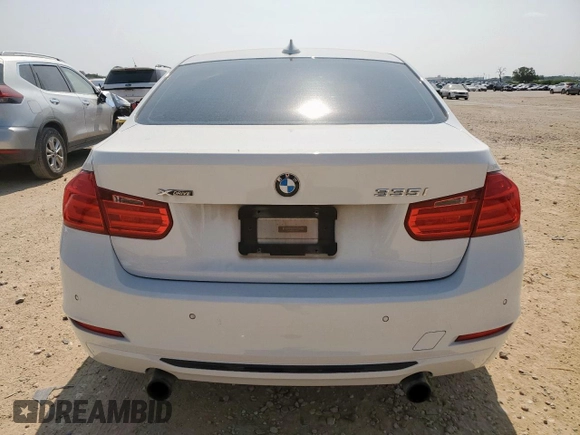 2013 BMW 3 Series 335i xDrive z VIN WBA3B9C50DJ899071, wystawiony jako Copart lot #50938045 z przebiegiem 143 532 mil mil oraz Szkoda całkowita • Salvage title. Historia ofert i sprzedaży dostępna na DreamBid. Obrazek 6.