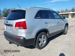 2013 Kia Sorento EX with VIN 5XYKUDA64DG357348, listed as a IAAI auction lot 42074290 with 113,703 mi miles. Bid and sale history available at carsss.com. Image 4.