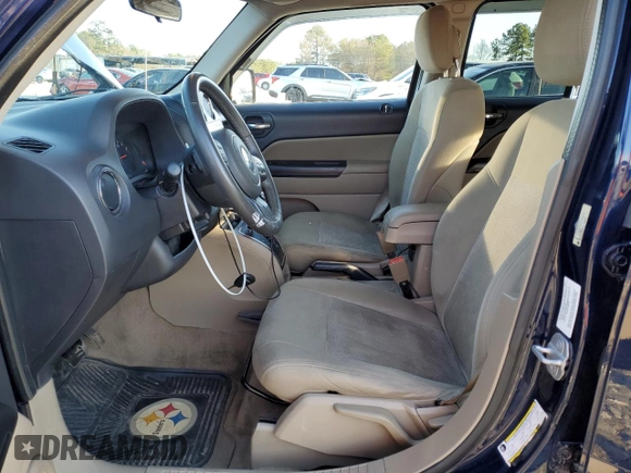 2013 Jeep Patriot Latitude with VIN 1C4NJPFB1DD191673, listed as a Copart auction lot 42014715 with 141,349 mi miles and Salvage Title. Bid and sale history available at carsss.com. Image 7.