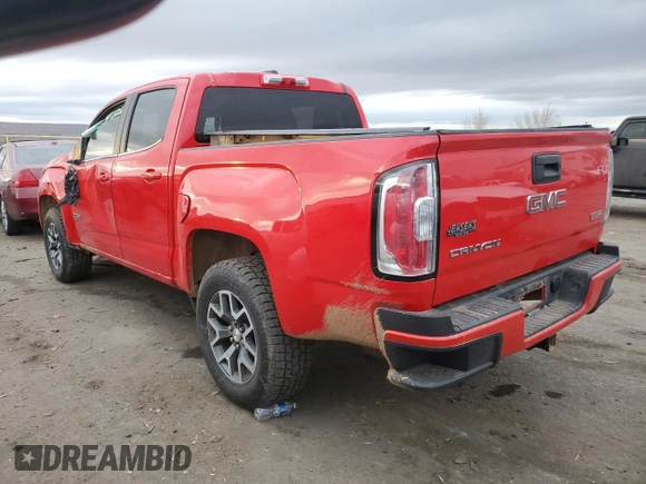 2015 GMC Canyon 4WD SLE with VIN 1GTG6BE30F1136918, listed as a Copart auction lot 82442884 with 102,361 mi miles and Salvage Title. Bid and sale history available at carsss.com. Image 2.