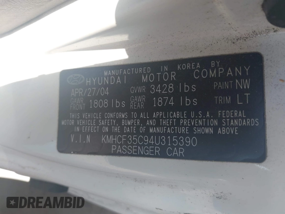 2004 Hyundai Accent with VIN KMHCF35C94U315390, listed as a IAAI auction lot 41391877 with 162,406 mi miles. Bid and sale history available at carsss.com. Image 9.