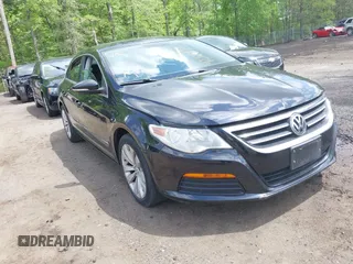 2011 Volkswagen CC Sport with VIN WVWMP7AN8BE709541, listed as a IAAI auction lot 42164892 with 154,547 mi miles. Bid and sale history available at carsss.com. Image 1.
