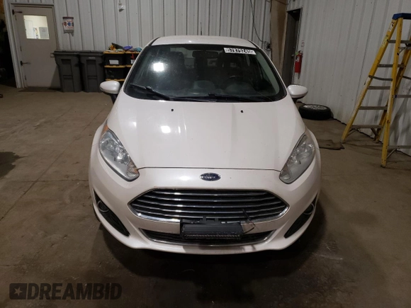 2016 Ford Fiesta Titanium z VIN 3FADP4CJ0GM167738, wystawiony jako Copart lot #57875245 z przebiegiem 159 230 mil mil oraz Czysty tytuł • Clean title. Historia ofert i sprzedaży dostępna na DreamBid. Obrazek 5.
