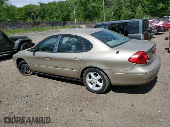 2001 Ford Taurus SE with VIN 1FAFP53U91G108049, listed as a Copart auction lot 55464715 with 85,748 mi miles and Salvage title. Bid and sale history available at DreamBid. Image 2.