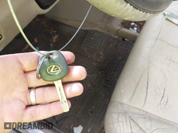 2006 Lexus RX 400h with VIN JTJHW31U260024648, listed as a IAAI auction lot 42632917 with 246,808 mi miles and . Bid and sale history available at DreamBid. Image 11.