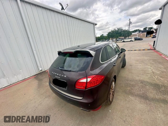 2014 Porsche Cayenne with VIN WP1AA2A25ELA97360, listed as a Copart auction lot 59060675 with 181,114 mi miles and Clean title. Bid and sale history available at DreamBid. Image 4.