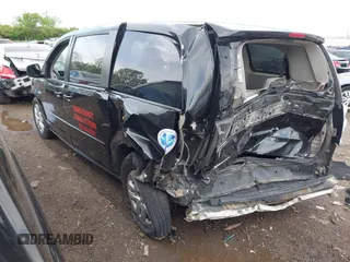 2017 Dodge Grand Caravan SE z VIN 2C4RDGBG0HR605507, wystawiony jako IAAI lot #42168499 z przebiegiem 169 422 mil mil oraz . Historia ofert i sprzedaży dostępna na DreamBid. Obrazek 3.