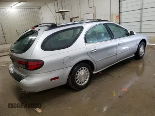 1999 Mercury Sable z VIN 1MEFM58S6XA647250, wystawiony jako Copart lot #83479674 z przebiegiem 166 550 mil mil oraz Szkody całkowita. Historia ofert i sprzedaży dostępna na DreamBid. Obrazek 3.